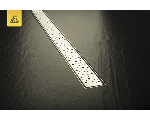 Canal de duș din oțel inoxidabil cu model punctat pe fundal întunecat