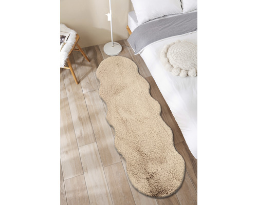 Covor cu fibre lungi într-un dormitor