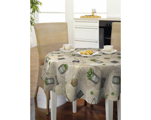 Masa rotundă cu față de masă imprimată în decor de bucătărie