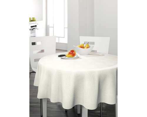 Masa rotundă cu o față de masă în sufragerie