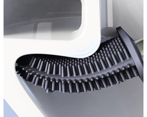 Prim-plan al unei toalete cu o perie de toaletă din silicon pentru curățare