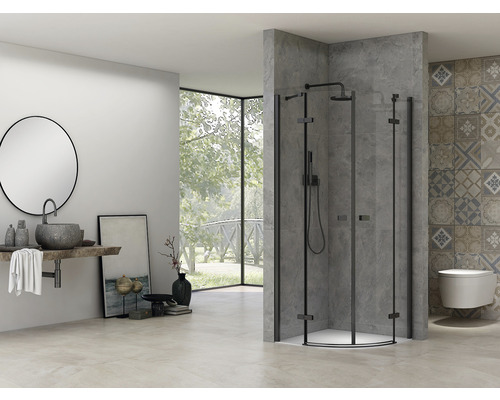 Baie modernă cu cabină de duș rotundă, chiuvetă cu oglindă rotundă și toaletă