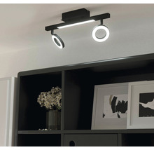 Lumină de tavan neagră cu lumini LED rotunde și design liniar.