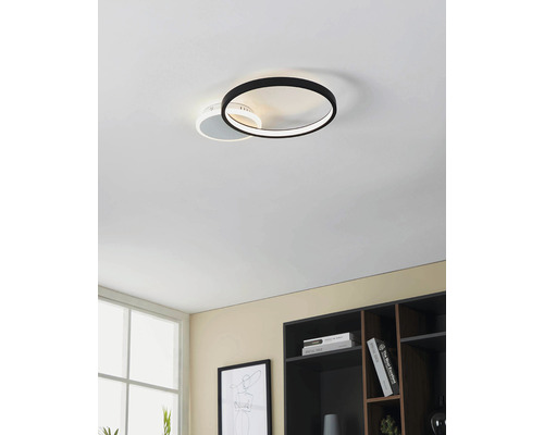 Plafonieră modernă cu două elemente circulare în sufragerie