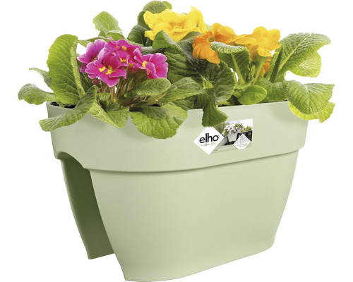 Jardinieră din plastic cu flori colorate de primăvară