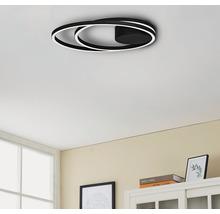 Plafonieră modernă cu design inelar în camera de zi