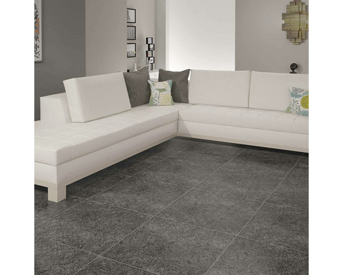 Cameră de zi cu canapea de colț și gresie