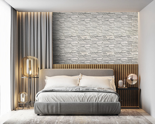 Dormitor cu perete de piatră, pat și noptieră