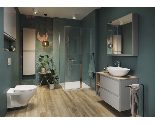 Baie modernă cu duș, chiuvetă și toaletă în fața unui perete cu model