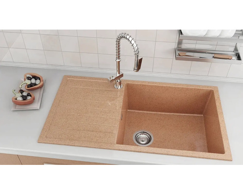 Chiuvetă din piatră deschisă la culoare cu zonă de scurgere și robinet