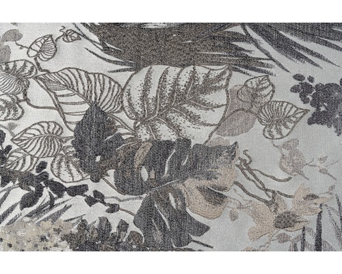 Prim-plan cu o țesătură cu model de plante