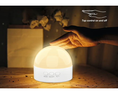 Lampă de noptieră cu control tactil și lumină caldă.