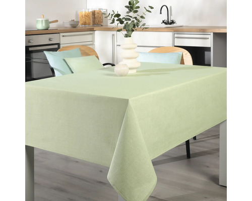 Masa de sufragerie cu față de masă verde deschis într-o bucătărie