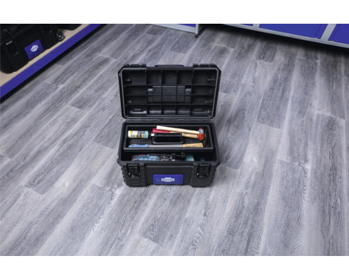 Cutie de scule deschisă cu scule