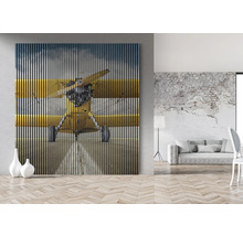 Tablou decorativ de perete cu motiv de aeronavă într-un spațiu de locuit modern
