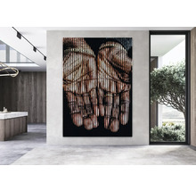 Tablou decorativ de perete cu mâini într-o cameră modernă