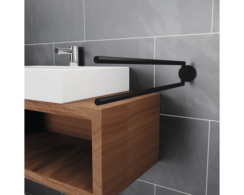 Chiuvetă cu dulap și suport rotativ pentru prosoape în baie