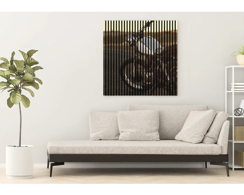 Tablou decorativ de perete cu o imagine cu o motocicletă în camera de zi.