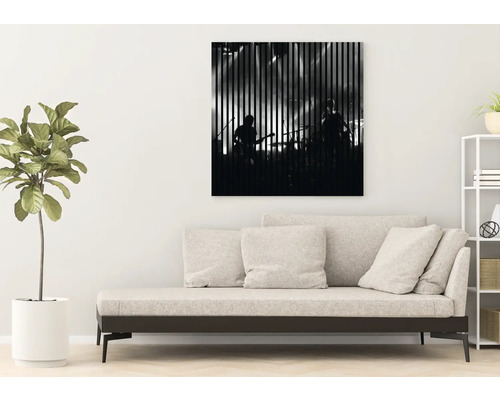 Imagine decorativă cu motiv de trupă muzicală deasupra unei canapele