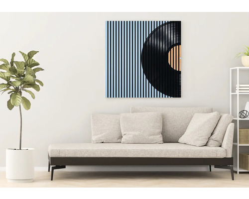 Living cu canapea și pictură murală a unui disc de gramofon