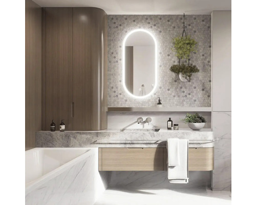 Baie modernă cu lavoar, oglindă cu iluminare, baterie și spațiu de depozitare