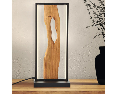 Lampă decorativă de masă cu aplicație din lemn într-un cadru negru