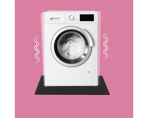 O mașină de spălat se află pe o platformă antivibrații.