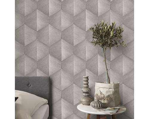 Tapetă cu model cu design geometric în dormitor.