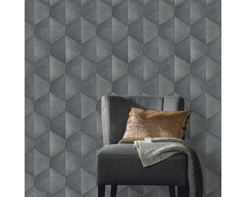 Amenajare cu tapet cu efect 3D gri, scaun și perne.