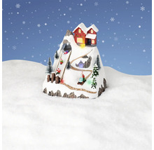 Peisaj decorativ de iarnă cu cabană montană și săniuși