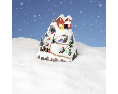 Peisaj decorativ de iarnă cu cabană montană și săniuși