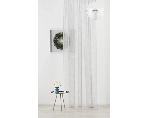 Șaluri decorative cu ochiuri, tablou de perete și măsuță laterală în cameră