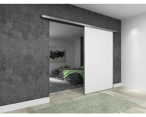 Scenă cu o ușă glisantă albă într-o cameră cu design modern.