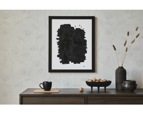 Natură statică decorativă cu imagine abstractă înrămată, veselă și flori uscate pe o comodă.