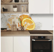 Protecție perete bucătărie cu motiv portocale în spatele aragazului
