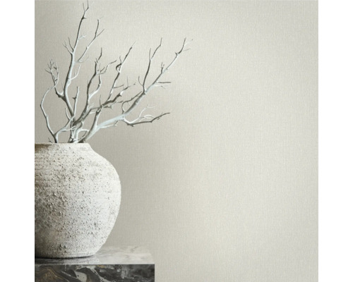 Prim-plan cu tapet cu model cu o vază și decorațiuni pe o suprafață