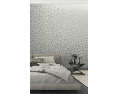 Dormitor cu tapet geometric, pat și noptieră