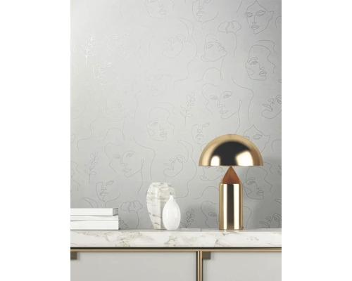 Tapet cu chipuri de femei ca desen liniar pe un perete de sufragerie