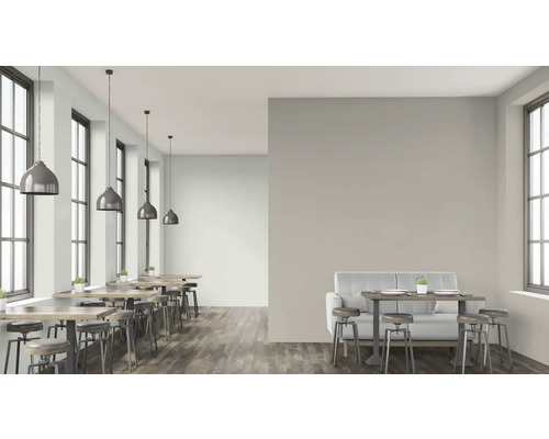 Zonă de restaurant cu mese, scaune, canapea și lămpi suspendate pentru un design modern