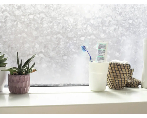 Folie decorativă pe pervazul ferestrei cu plante și articole de baie