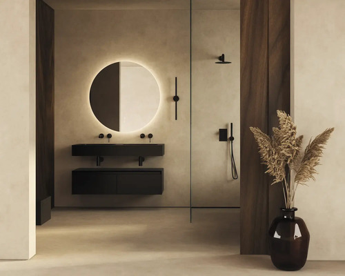 Baie modernă cu lavoar, oglindă cu iluminare și duș.