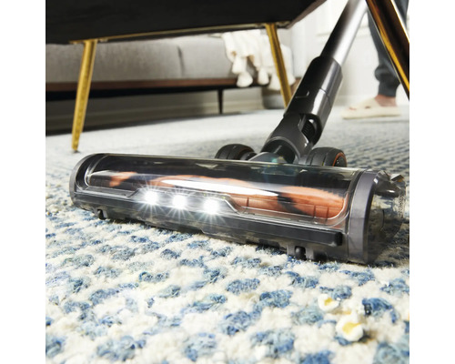 Aspirator cu iluminare curăță covorul