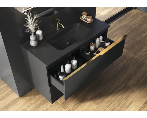 Chiuvetă neagră cu sertar deschis, baterie și lavoar