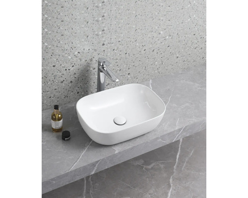 Lavoar ceramic montat pe blat cu baterie