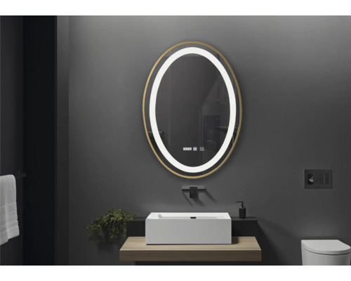 Baie modernă cu oglindă ovală, chiuvetă așezată și pereți închiși la culoare