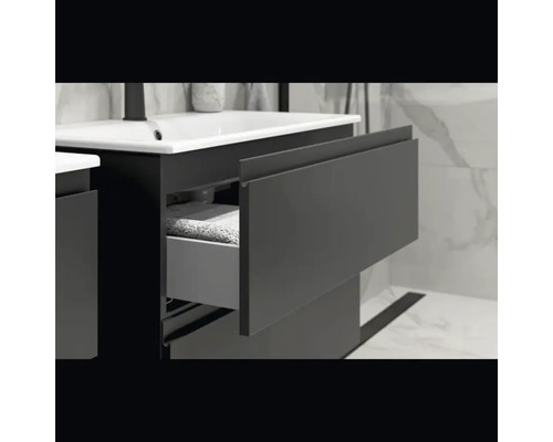 Dulap sub chiuvetă cu sertar într-o baie