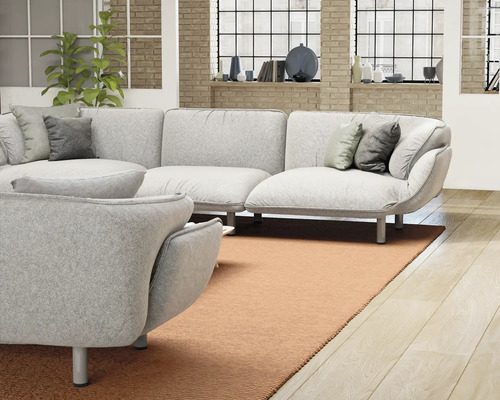 Living luminos cu canapea mare, fotoliu și covor