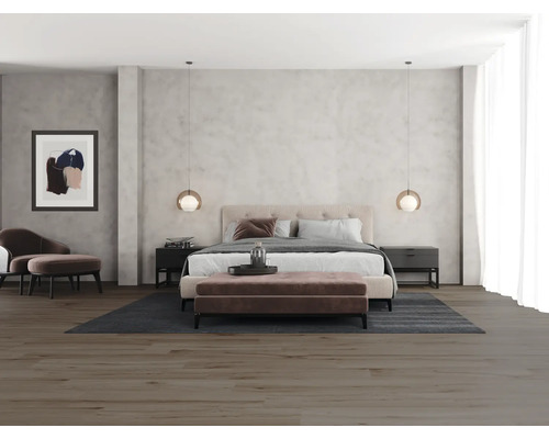 Dormitor cu pat dublu, noptiere, zonă de relaxare și lămpi suspendate