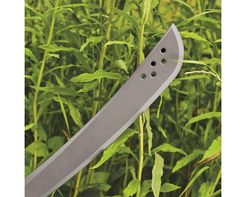 Macetă în fața plantelor verzi