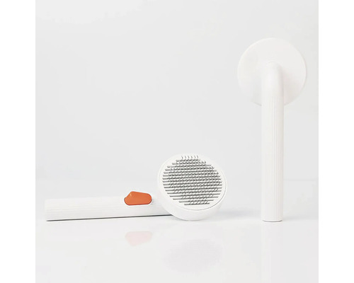 Două dispozitive de îndepărtat scame cu mâner